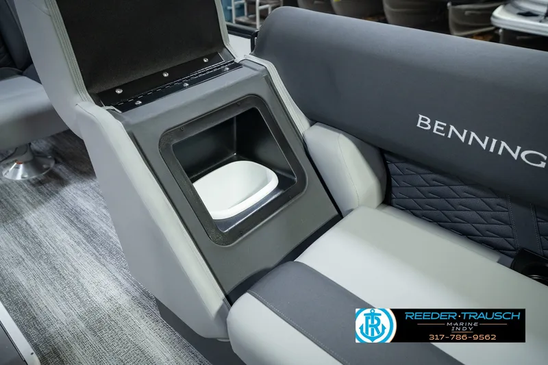 Slide: The Image of 2027 Bennington 22 SSR boat interior with integrated storage compartment and seating. - 30