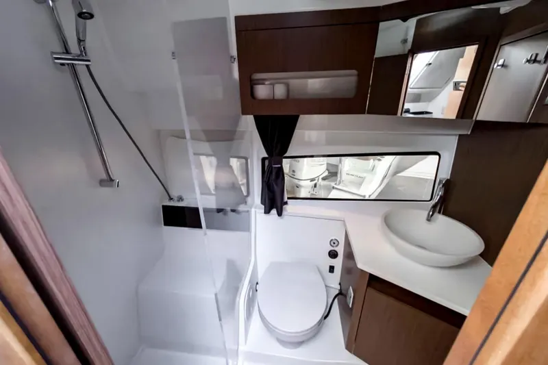 Slide: The Image of Modern bathroom interior of 2021 Beneteau America Antares 11 yacht, featuring shower and sink. - 13