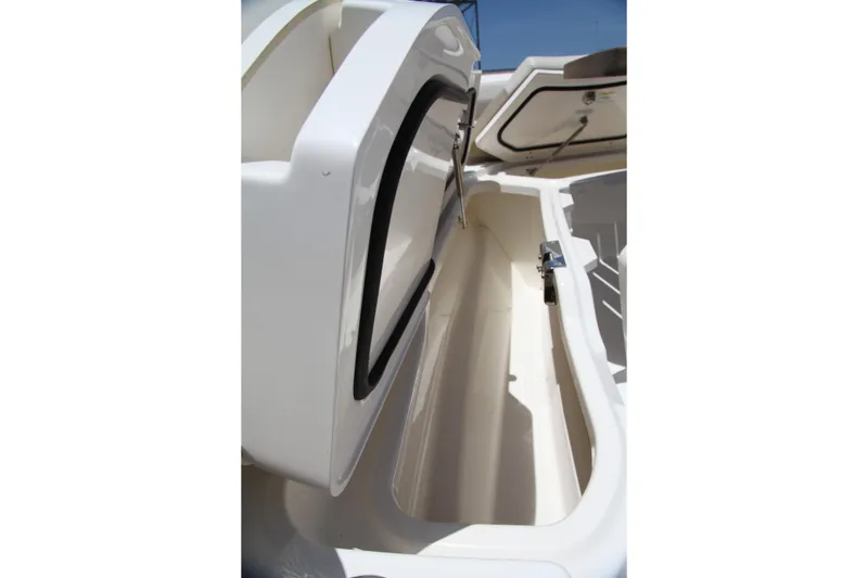 Slide: The Image of Open storage compartment on a 2019 Boston Whaler 380 Outrage boat. - 57