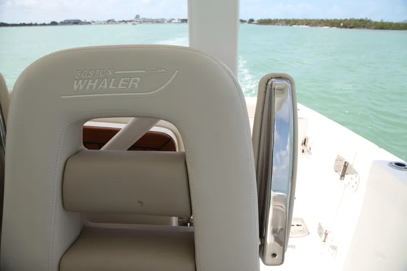 Slide: The Image of 2019 Boston Whaler 380 Outrage boat seat with ocean view. - 21