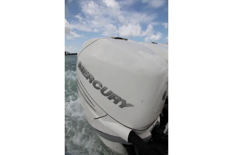 Slide: The Image of Mercury engine on 2019 Boston Whaler 380 Outrage, ocean backdrop. - 14