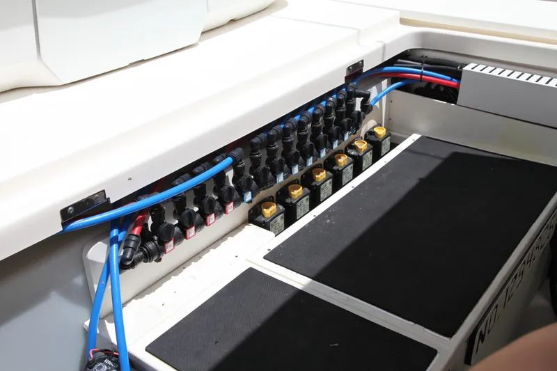Slide: The Image of Electrical panel of a 2019 Boston Whaler 380 Outrage boat, featuring wiring and components. - 35