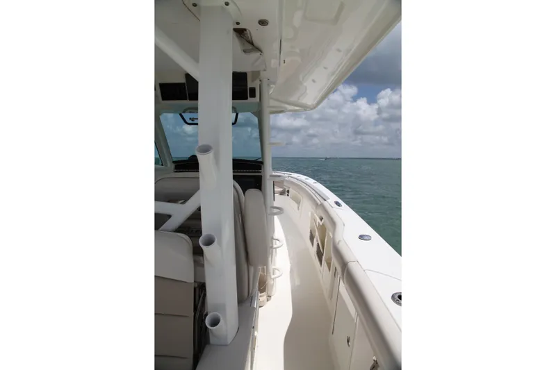 Slide: The Image of 2019 Boston Whaler 380 Outrage boat deck with ocean view and clear skies. - 26