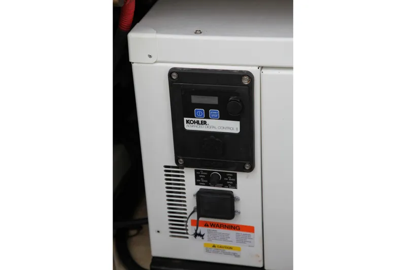 Slide: The Image of Kohler generator control panel on 2019 Boston Whaler 380 Outrage boat. - 33
