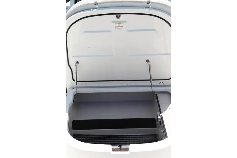 Slide: The Image of Open storage compartment on a 2019 Boston Whaler 380 Outrage boat. - 62