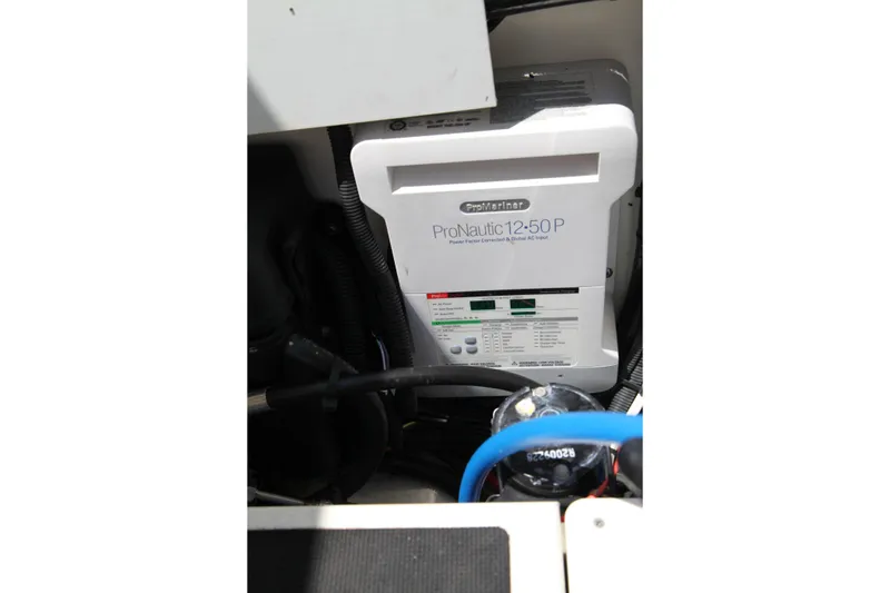 Slide: The Image of ProNautic 12-50P charger in 2019 Boston Whaler 380 Outrage boat engine compartment. - 34