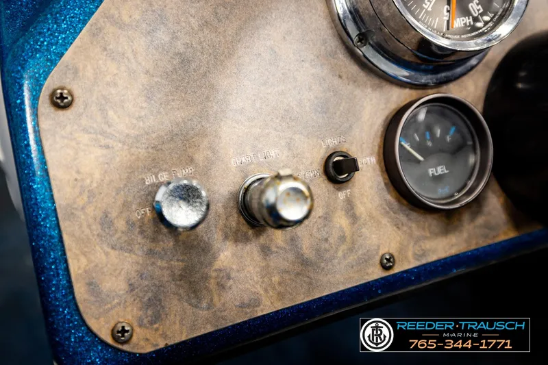 Slide: The Image of Dashboard of a 1980 Ranger 175 VS boat with fuel gauge and controls. - 24