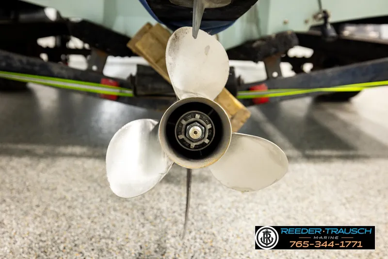 Slide: The Image of Propeller of a 1980 Ranger 175 VS boat in a garage setting. - 40