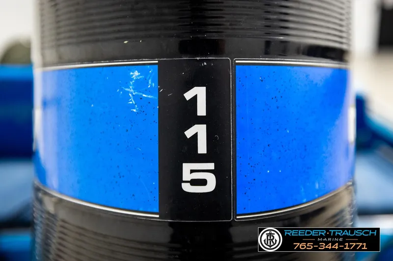 Slide: The Image of Close-up of a 1980 Ranger 175 VS boat engine with "115" label. - 39