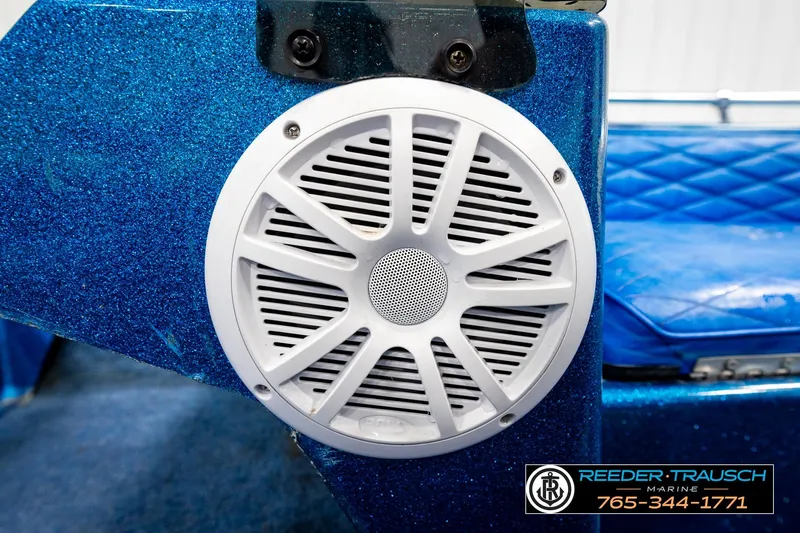 Slide: The Image of White speaker on blue 1980 Ranger 175 VS boat interior, Reeder Trausch Marine logo visible. - 31