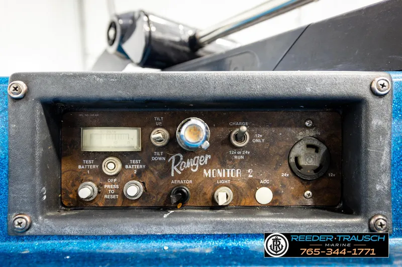 Slide: The Image of Control panel of a 1980 Ranger 175 VS boat with various switches and gauges. - 36