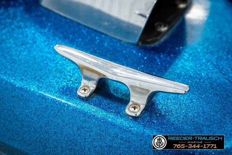 Slide: The Image of Chrome cleat on blue 1980 Ranger 175 VS boat, Reeder-Trausch Marine branding. - 44