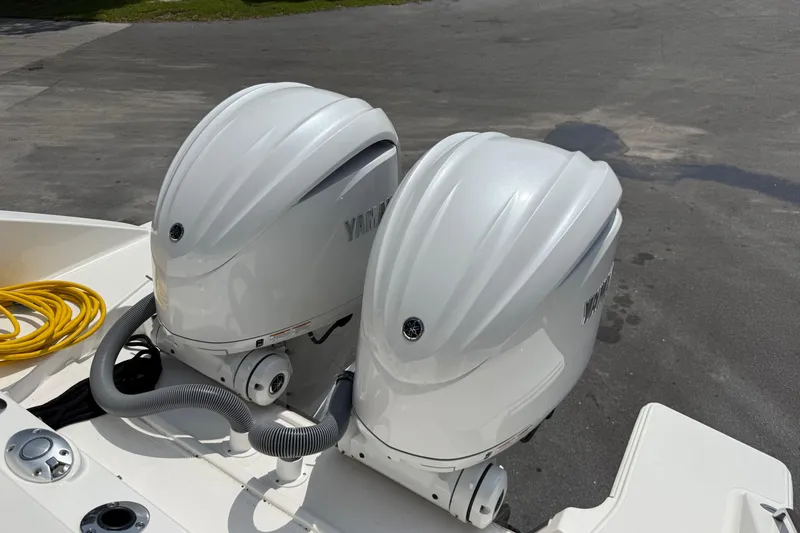 Slide: The Image of 2024 Pursuit DC 306 Dual Console with twin Yamaha outboard engines. - 43