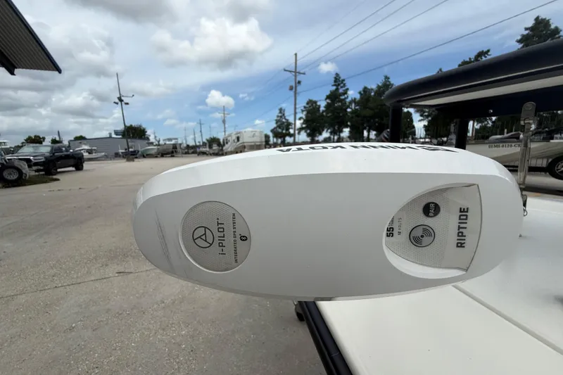 Slide: The Image of Minn Kota Riptide motor on 2020 Skimmer Skiff 14 boat, outdoor setting. - 10