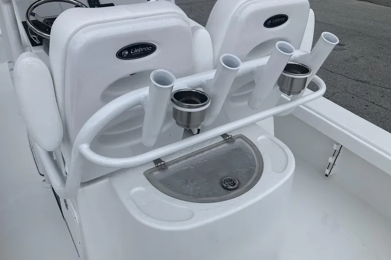 Slide: The Image of Fishing rod holders and cup holders on a 2026 BlackJack 256 Coastal boat. - 10