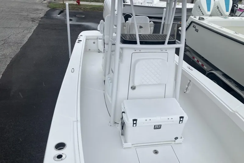 Slide: The Image of 2026 BlackJack 256 Coastal boat interior with seating and storage compartments. - 12
