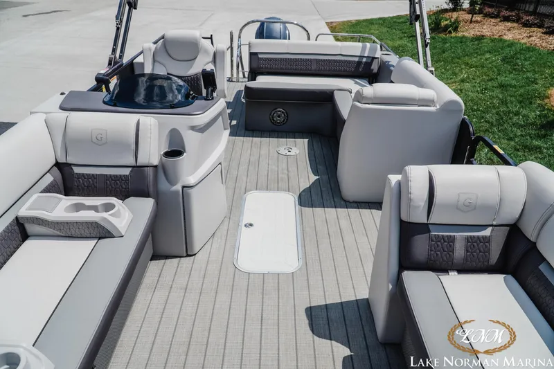 Slide: The Image of 2023 Godfrey Sweet Water 2286 SFL pontoon boat interior with luxurious seating and modern design. - 13