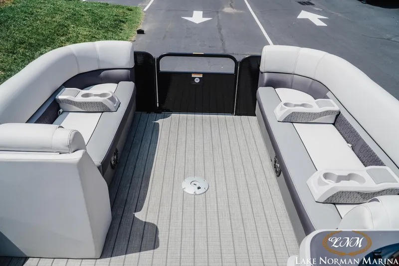 Slide: The Image of 2023 Godfrey Sweet Water 2286 SFL pontoon boat interior with plush seating and cup holders. - 11