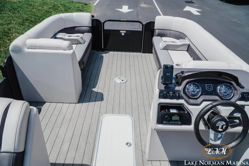 Slide: The Image of 2023 Godfrey Sweet Water 2286 SFL pontoon boat interior with modern dashboard and seating. - 8