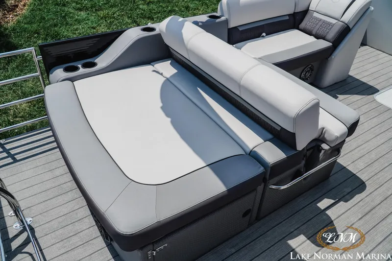 Slide: The Image of 2023 Godfrey Sweet Water 2286 SFL boat interior with luxurious seating and cup holders. - 6