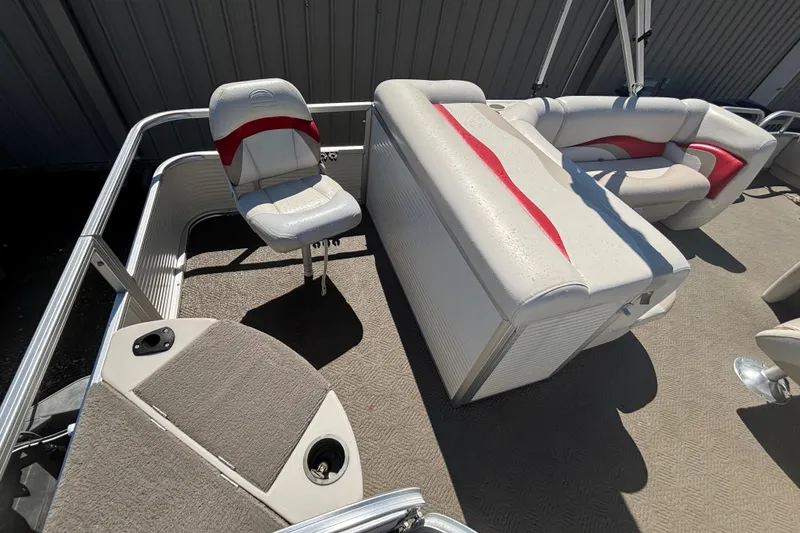 Slide: The Image of 2008 Sun Tracker Fishin' Barge 21 Signature Series interior with seating and fishing area. - 8