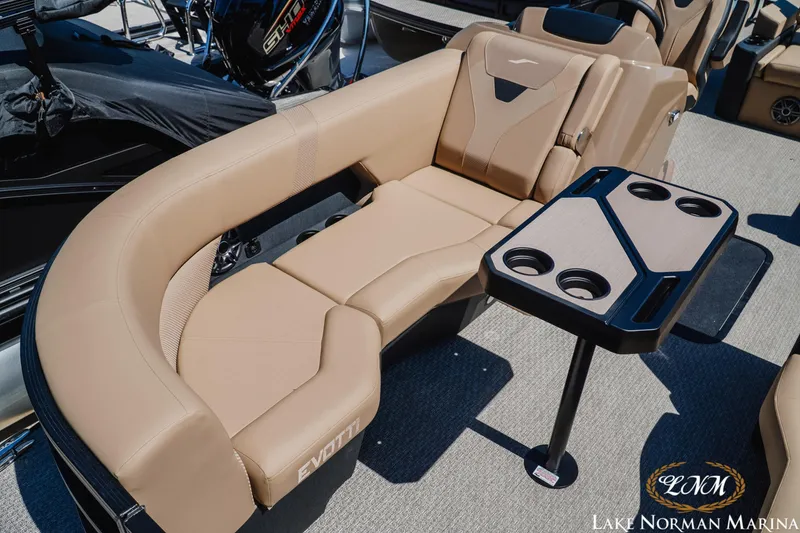 Slide: The Image of Luxurious seating on 2026 Evotti 523CS boat with cup holders at Lake Norman Marina. - 16