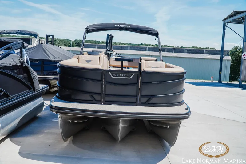 Slide: The Image of 2026 Evotti 523CS pontoon boat at Lake Norman Marina, featuring sleek design and spacious seating. - 3