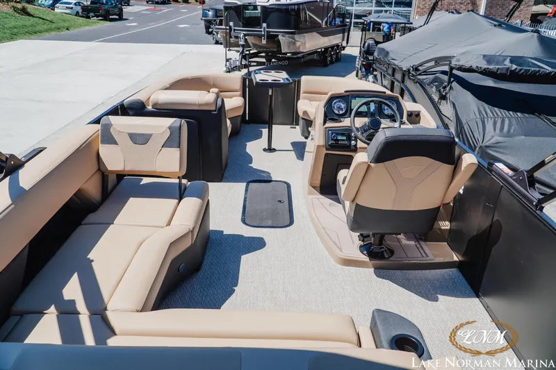 Slide: The Image of Luxurious 2026 Evotti 523CS pontoon boat interior with plush seating and modern dashboard. - 8