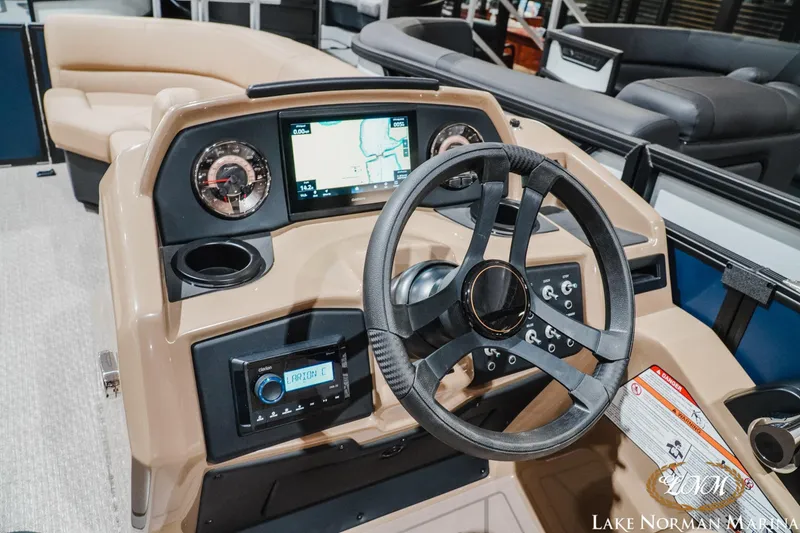 Slide: The Image of Interior of 2027 Evotti 521QL boat with steering wheel and navigation display. - 13