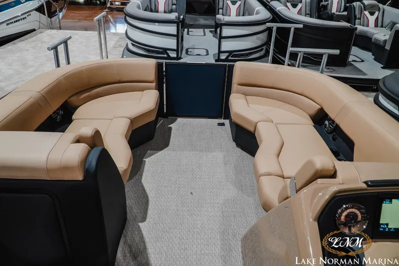 Slide: The Image of Luxurious interior of 2027 Evotti 521QL boat with beige seating at Lake Norman Marina. - 14