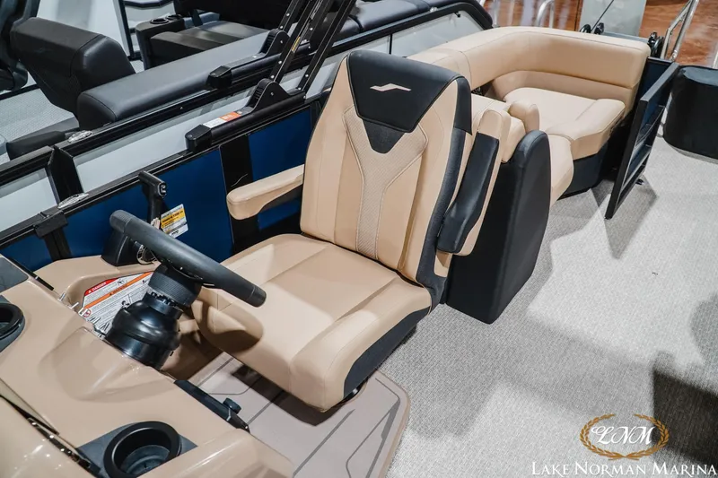 Slide: The Image of Luxurious interior of 2027 Evotti 521QL boat with beige seating at Lake Norman Marina. - 22