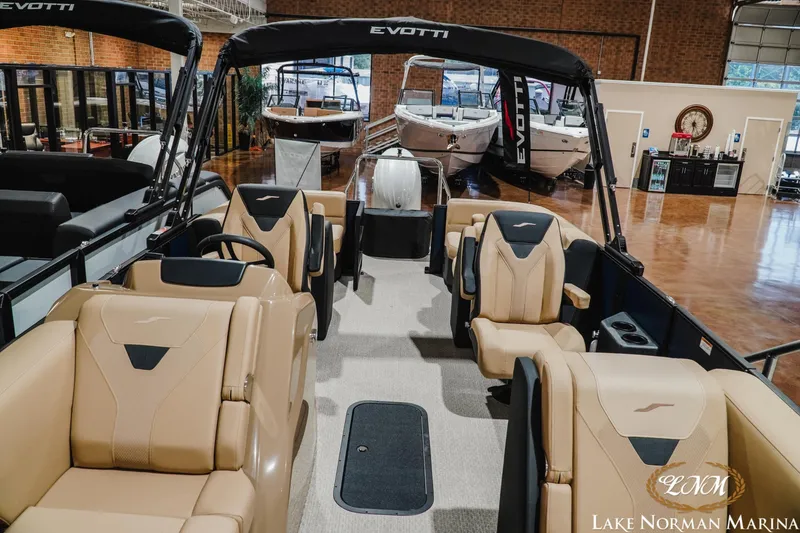 Slide: The Image of 2027 Evotti 521QL luxury pontoon boat interior at Lake Norman Marina showroom. - 15
