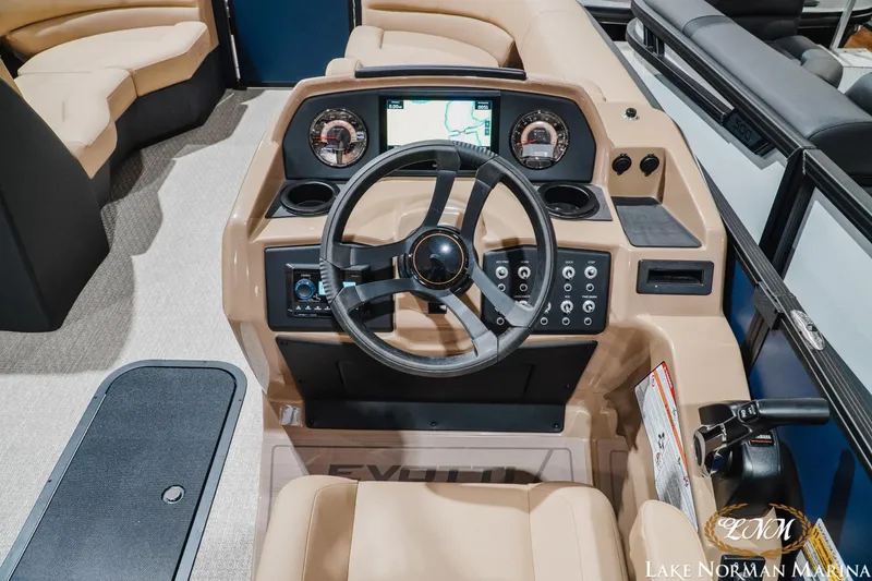 Slide: The Image of 2027 Evotti 521QL boat dashboard with steering wheel and control panel. - 12