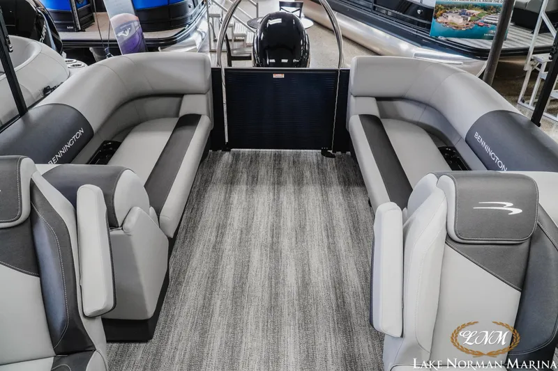 Slide: The Image of 2027 Bennington 23SSR pontoon boat interior with gray seating at Lake Norman Marina. - 19