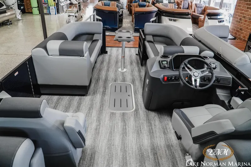 Slide: The Image of Interior of 2027 Bennington 23SSR pontoon boat with modern seating and steering console. - 9