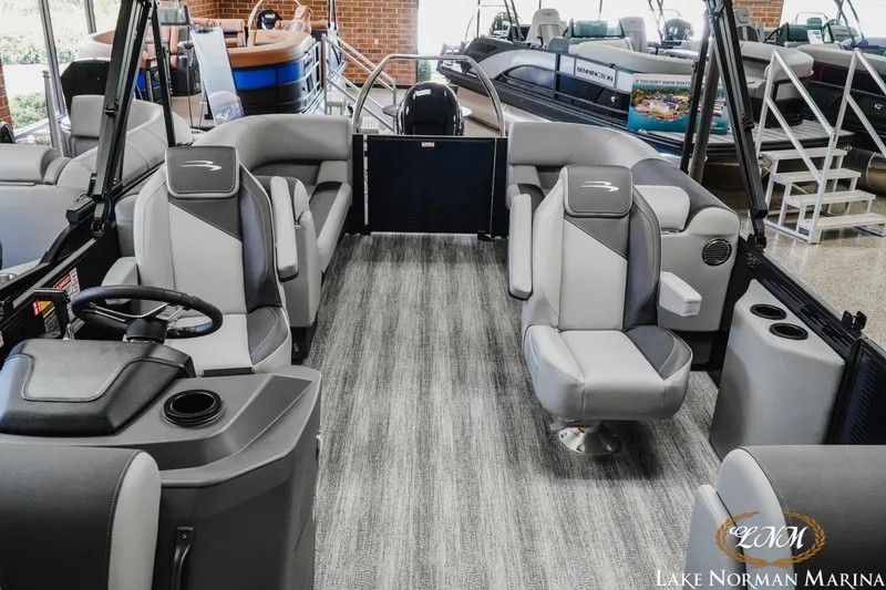 Slide: The Image of Interior of a 2027 Bennington 23SSR pontoon boat at Lake Norman Marina showroom. - 16