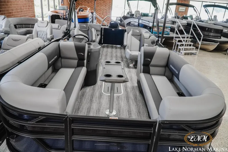 Slide: The Image of 2027 Bennington 23SSR pontoon boat with luxurious seating at Lake Norman Marina. - 13