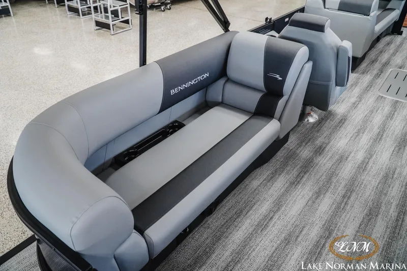 Slide: The Image of 2027 Bennington 23SSR boat interior with gray seating at Lake Norman Marina. - 7