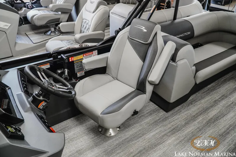 Slide: The Image of Luxurious interior of 2027 Bennington 23SSR pontoon boat with plush seating and modern helm. - 18