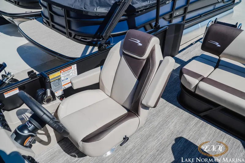 Slide: The Image of 2027 Bennington 23ssb boat interior with luxurious seating at Lake Norman Marina. - 20