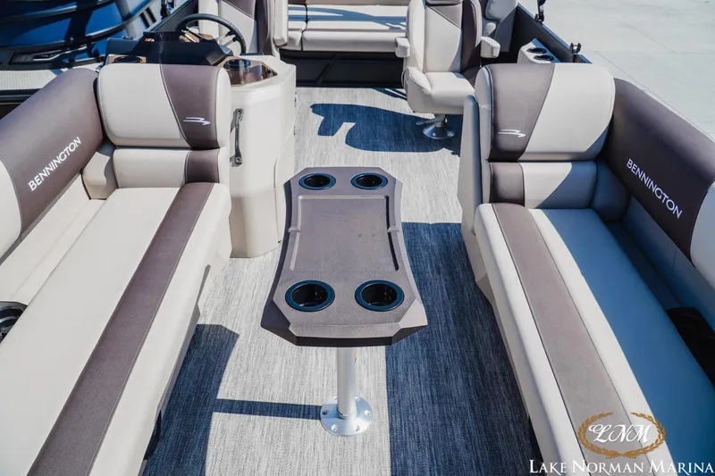 Slide: The Image of Interior of 2027 Bennington 23ssb pontoon boat with seating and table, Lake Norman Marina. - 15