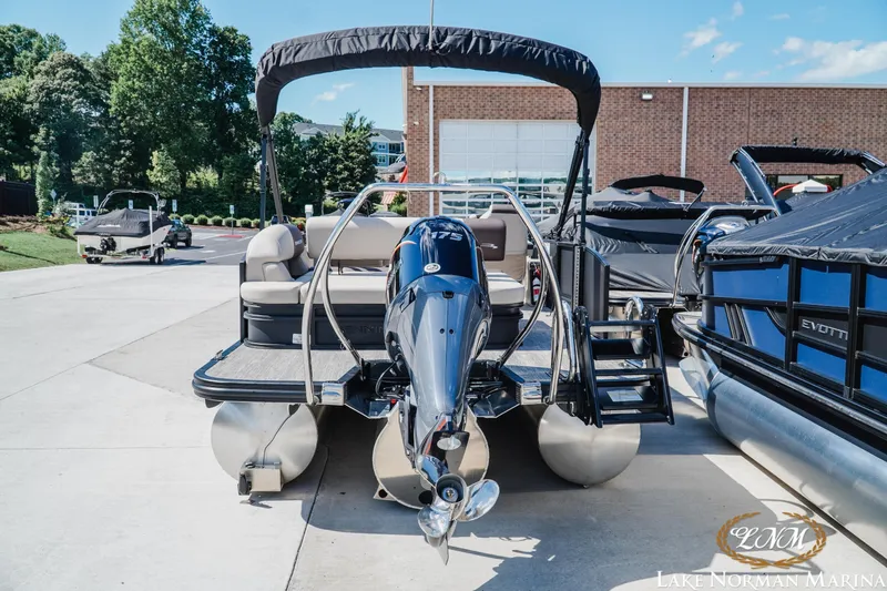 Slide: The Image of 2027 Bennington 23ssb pontoon boat with outboard motor at Lake Norman Marina. - 5