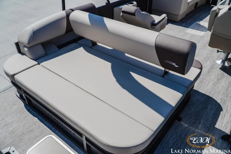 Slide: The Image of 2027 Bennington 23ssb boat interior with luxurious seating at Lake Norman Marina. - 7