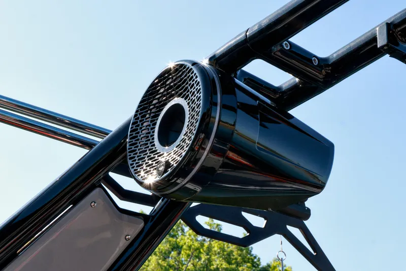 Slide: The Image of Close-up of a 2024 Centurion Fi23 boat speaker against a clear blue sky. - 17