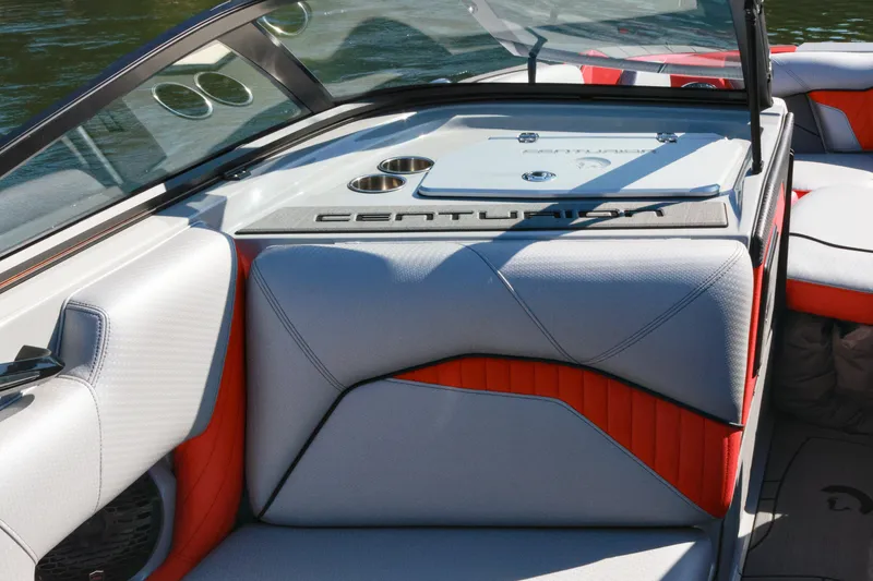 Slide: The Image of 2024 Centurion Fi23 boat interior with stylish seating and cup holders. - 11