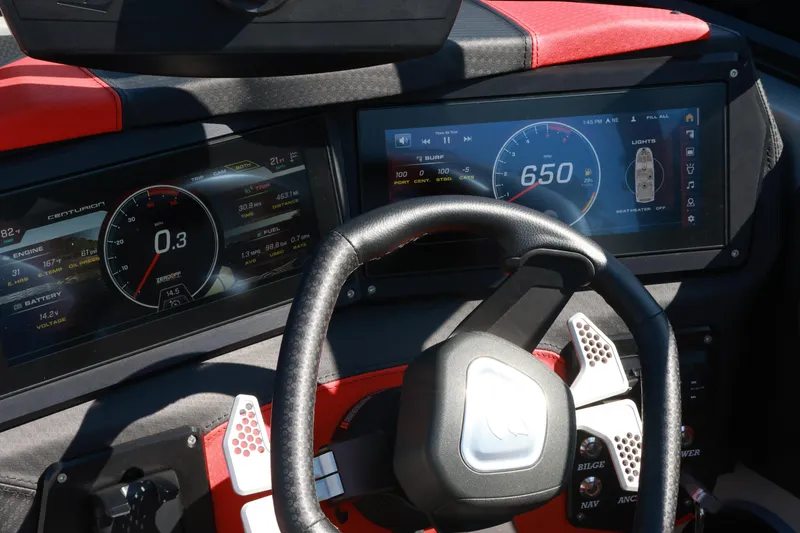 Slide: The Image of 2024 Centurion Fi23 dashboard with digital displays and steering wheel. - 12