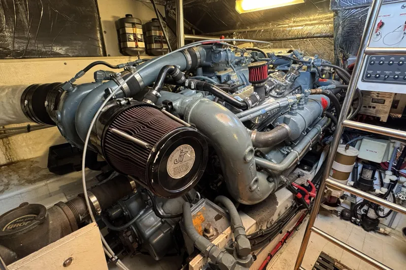 Slide: The Image of Engine room of a 1995 Tiara Yachts 4300 Open, showcasing detailed machinery and components. - 31