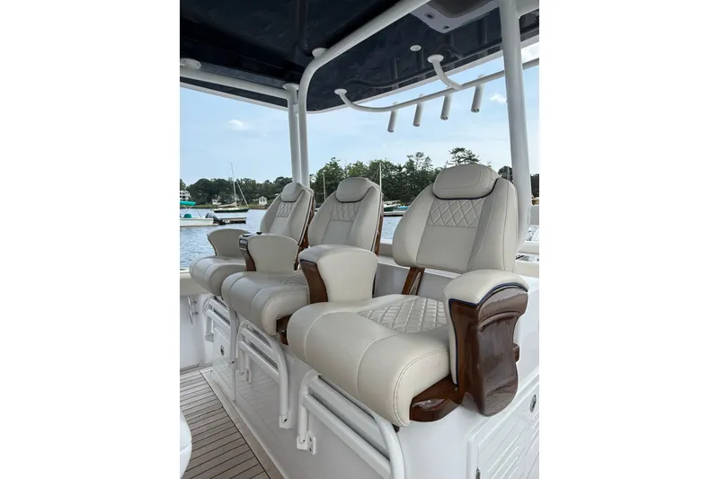 Slide: The Image of Luxurious seating on a 2025 Jupiter 43 boat, featuring elegant design and craftsmanship. - 39