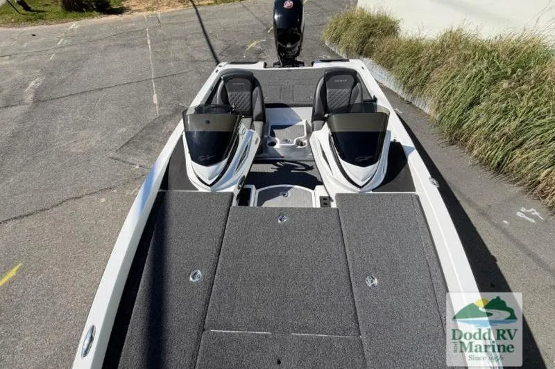 Slide: The Image of 2021 Caymas CX 18 SS boat with dual seats and carpeted deck, displayed at Dodd RV Marine. - 7
