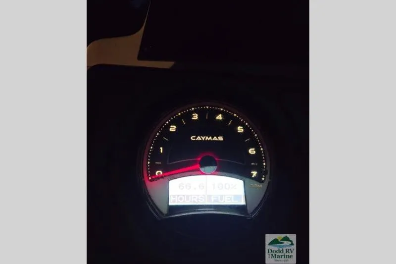 Slide: The Image of Dashboard of 2021 Caymas CX 18 SS boat showing tachometer and fuel gauge. - 22